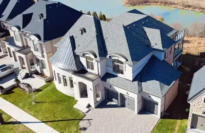 Luxurious 5-Bed, 6-Bath French Chateau in Kleinburg with 4-Car Garage and Scenic Views
